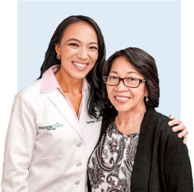 Dental care with Dr. Charmaine Johnson and a patient at Premier Smile Center