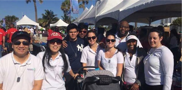 Team members of Premier Smile Center at a Fort Lauderdale charity event
